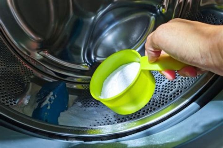 Can you put bicarbonate of soda in washing machine with clothes?