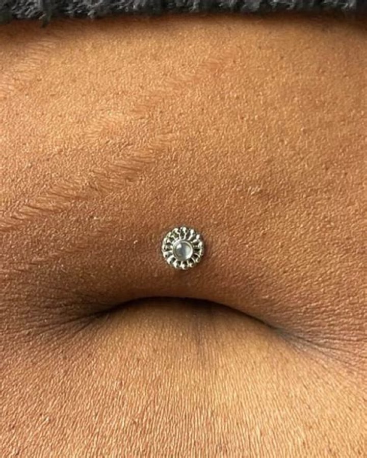 How can I hide my belly button piercing hole?