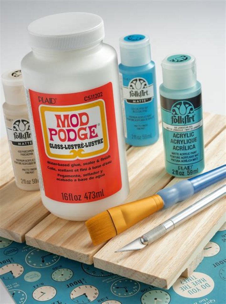 How long should Modge Podge dry before painting?
