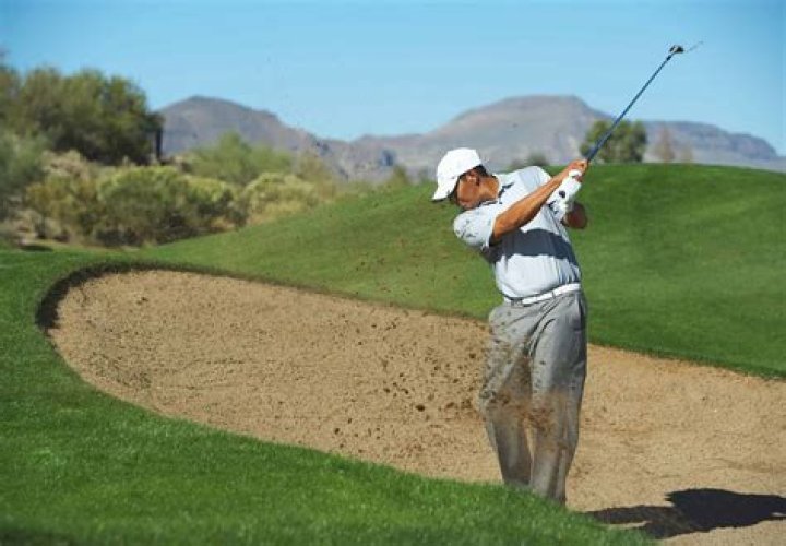 Is it a penalty if you hit your ball on a practice swing?