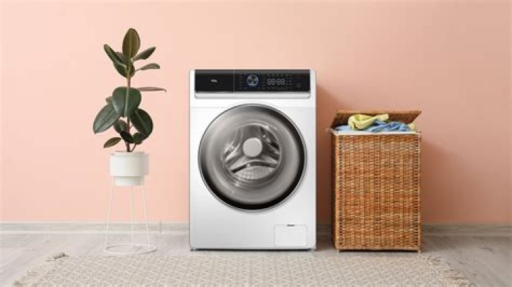 Why do British homes have washing machines in the kitchen?