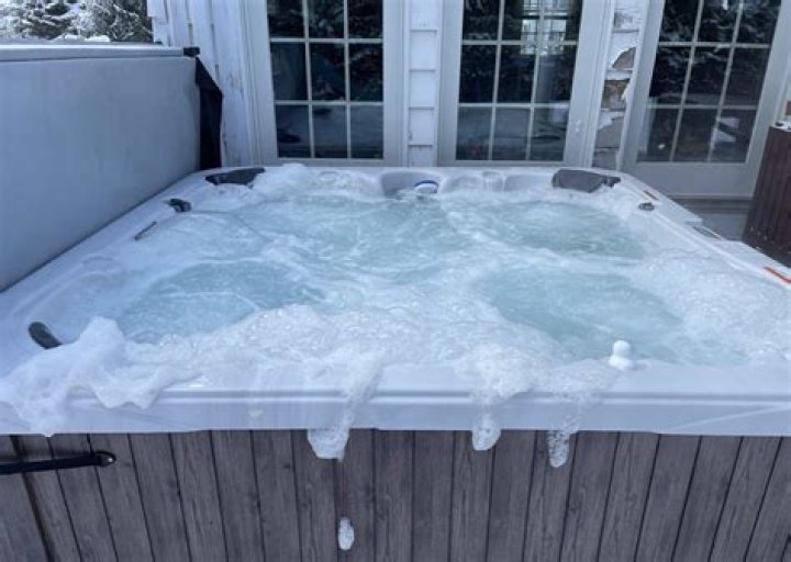 Why is my hot tub water cloudy and foamy?
